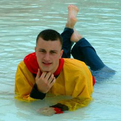 power training in pool with red anorak